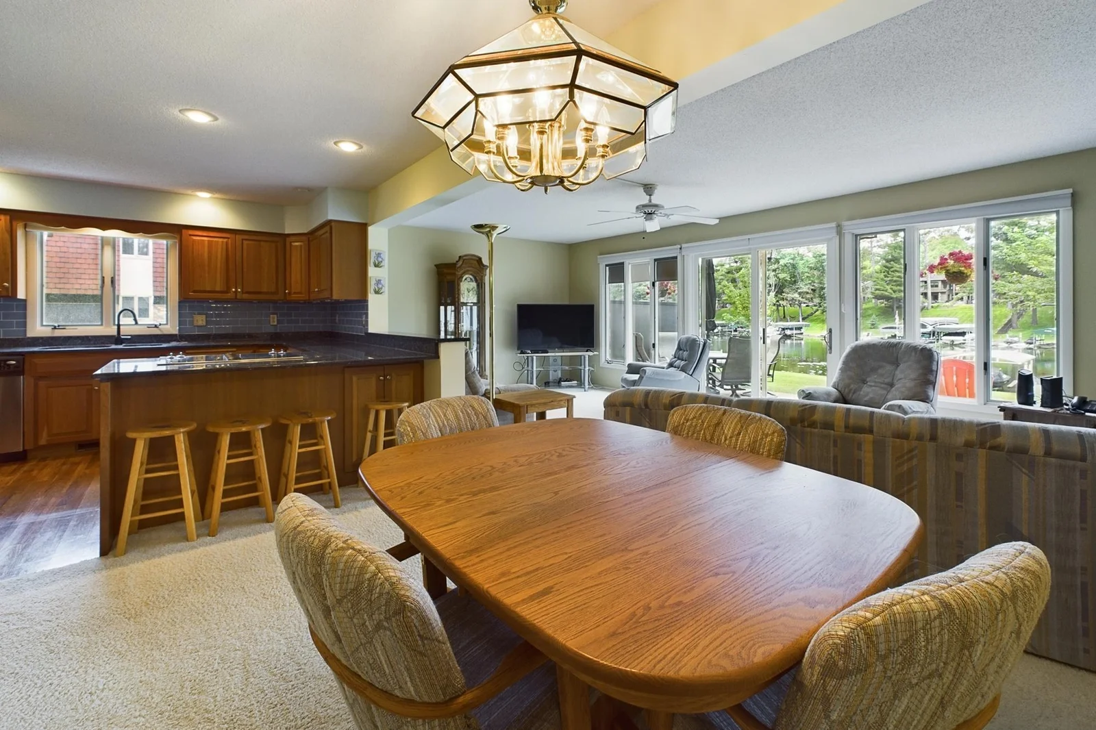 Kitchen, dining and livng room all easily viewing the Lake Margaret Channel.