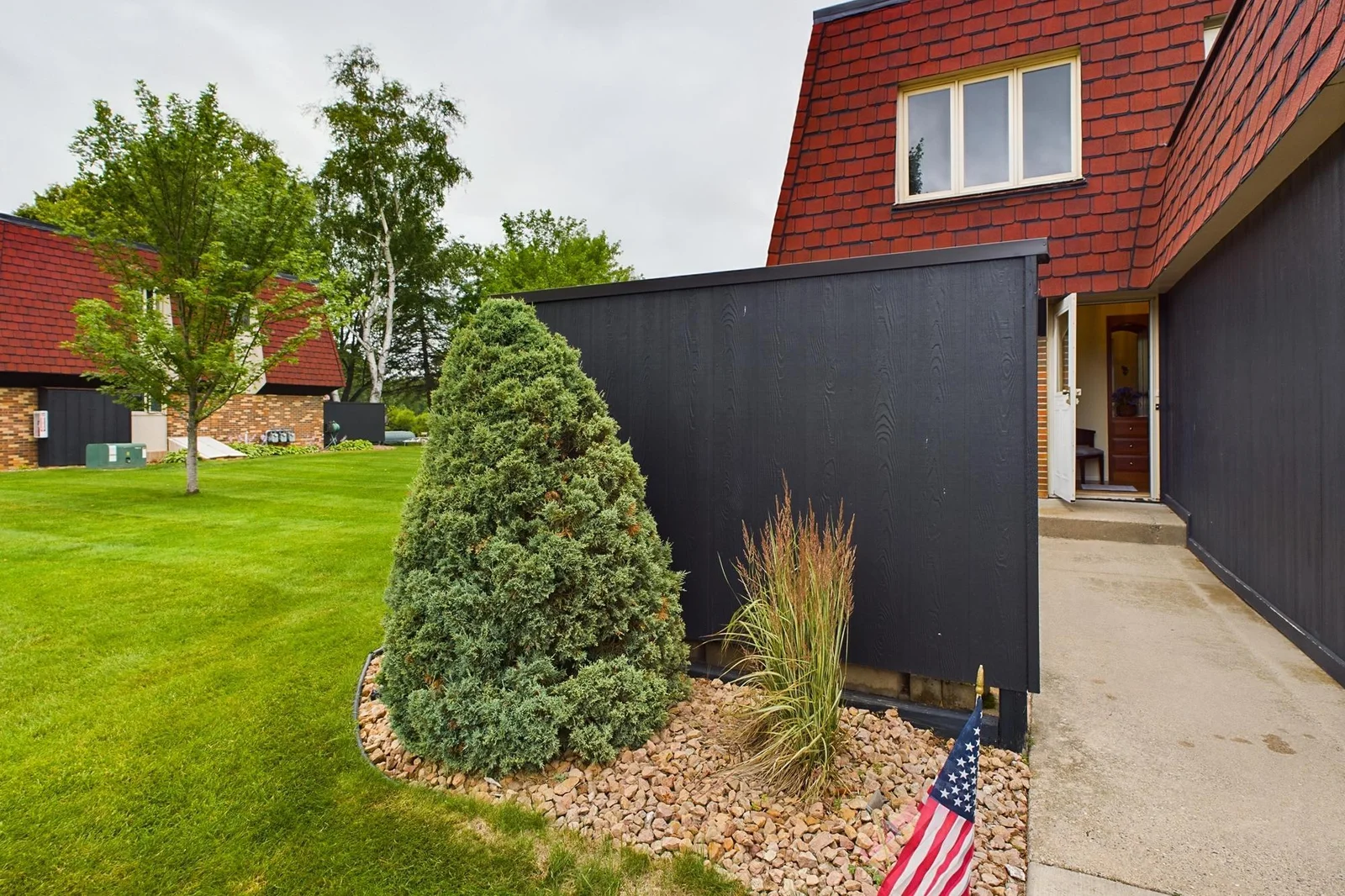 Well and professionally maintained lawn and landscaping.