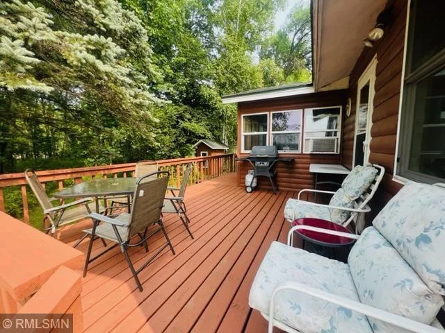 Nice lake facing deck and woods between neighbors for privacy