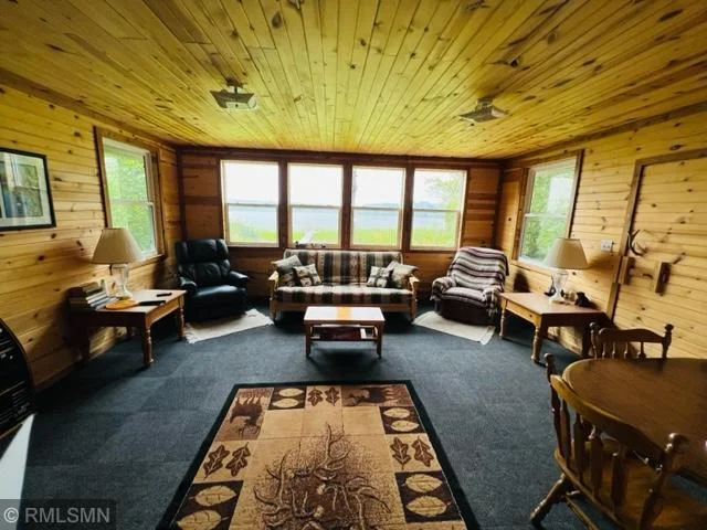Lake facing family room looks out to lake