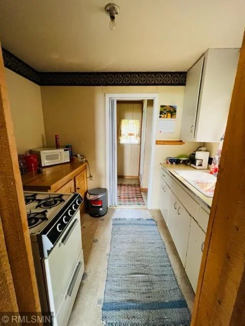 Walk-thru kitchen from living room