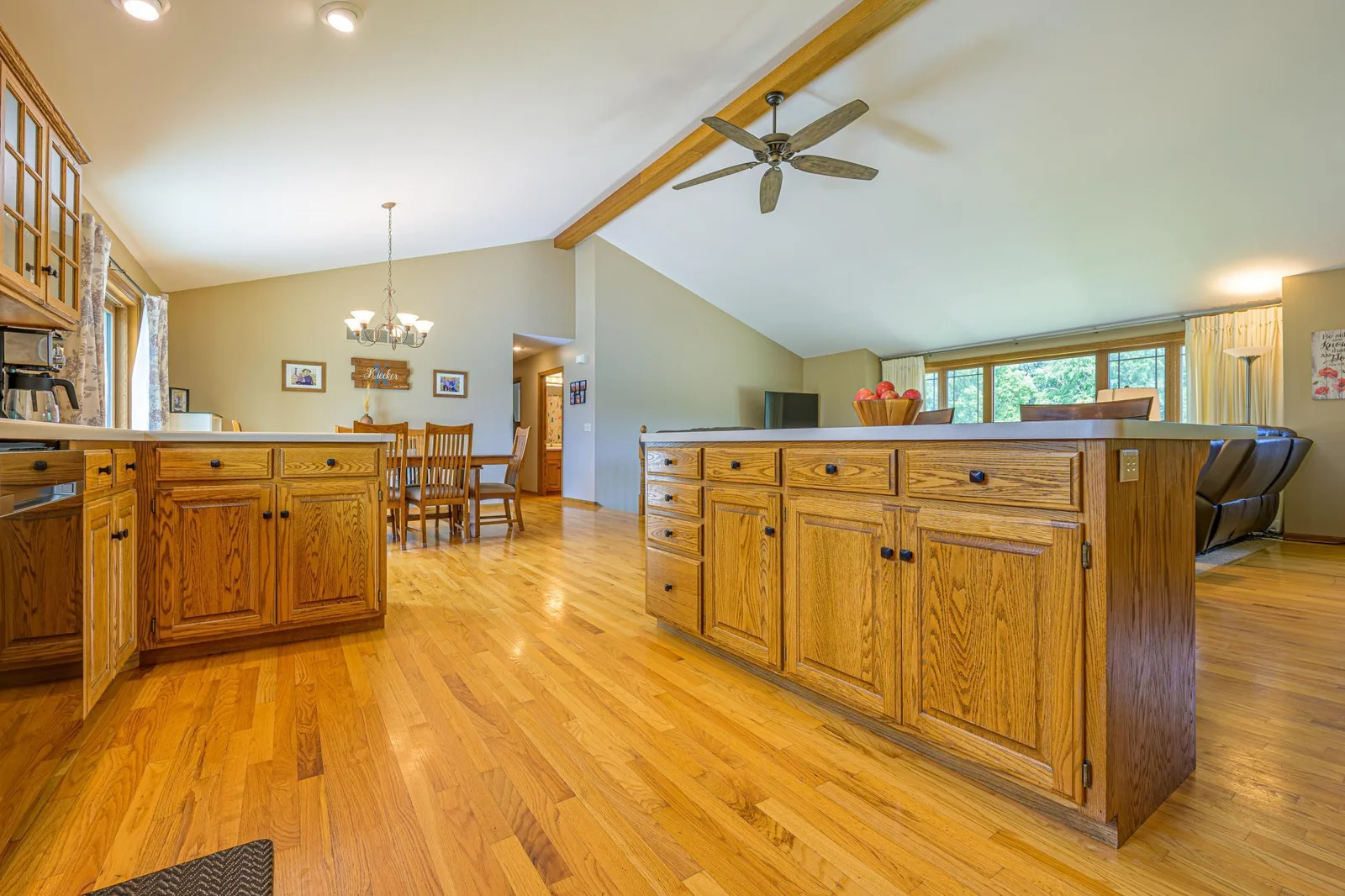 The open concept kitchen overlooks the living room and dining area.