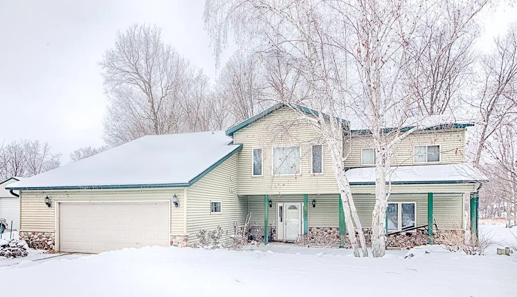 A current winter view of this amazing custom home and property!