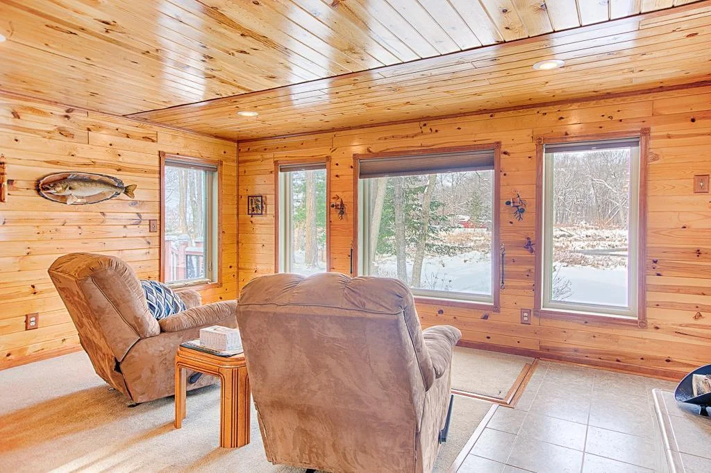 Another living room view. The crawl space access to the storm shelter and tremendous storage space is just underneath the carpeted area here...
