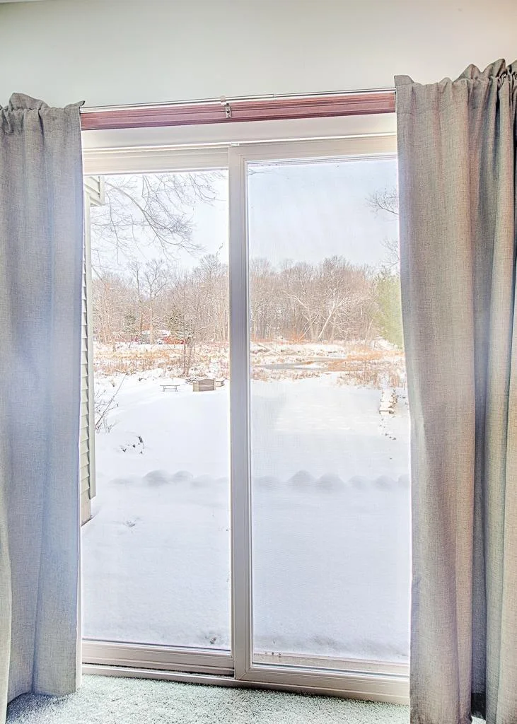 Bedroom view overlooking back yard and creek.