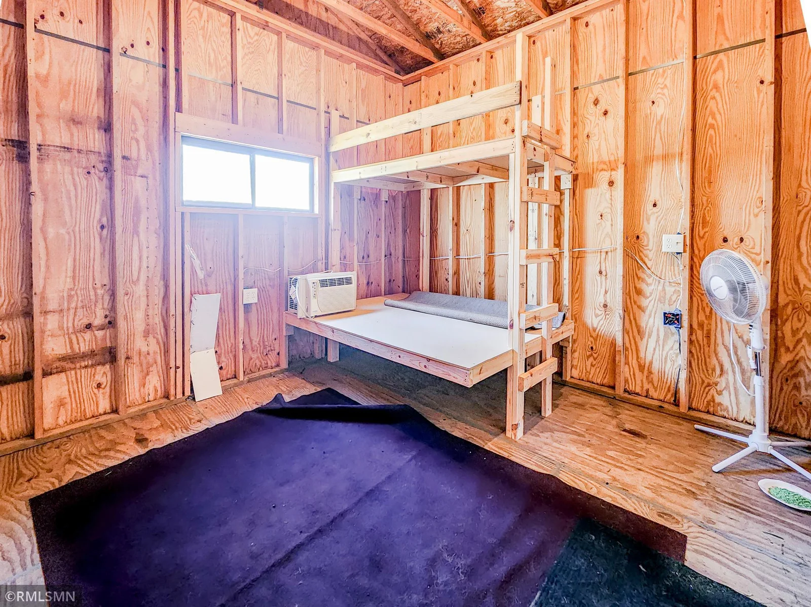 Shed wich is used as over-flow sleeping space/bunk house.