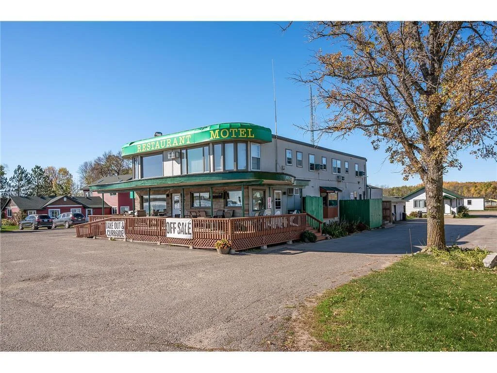 Main building is a two story commercial building with 6 motel rooms, commercial kitchen, and restaurant