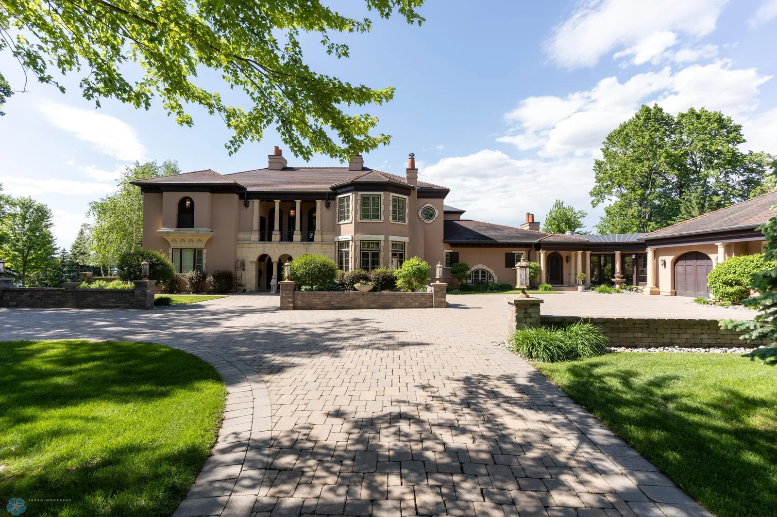 Front with Grand Paver Stone Driveway