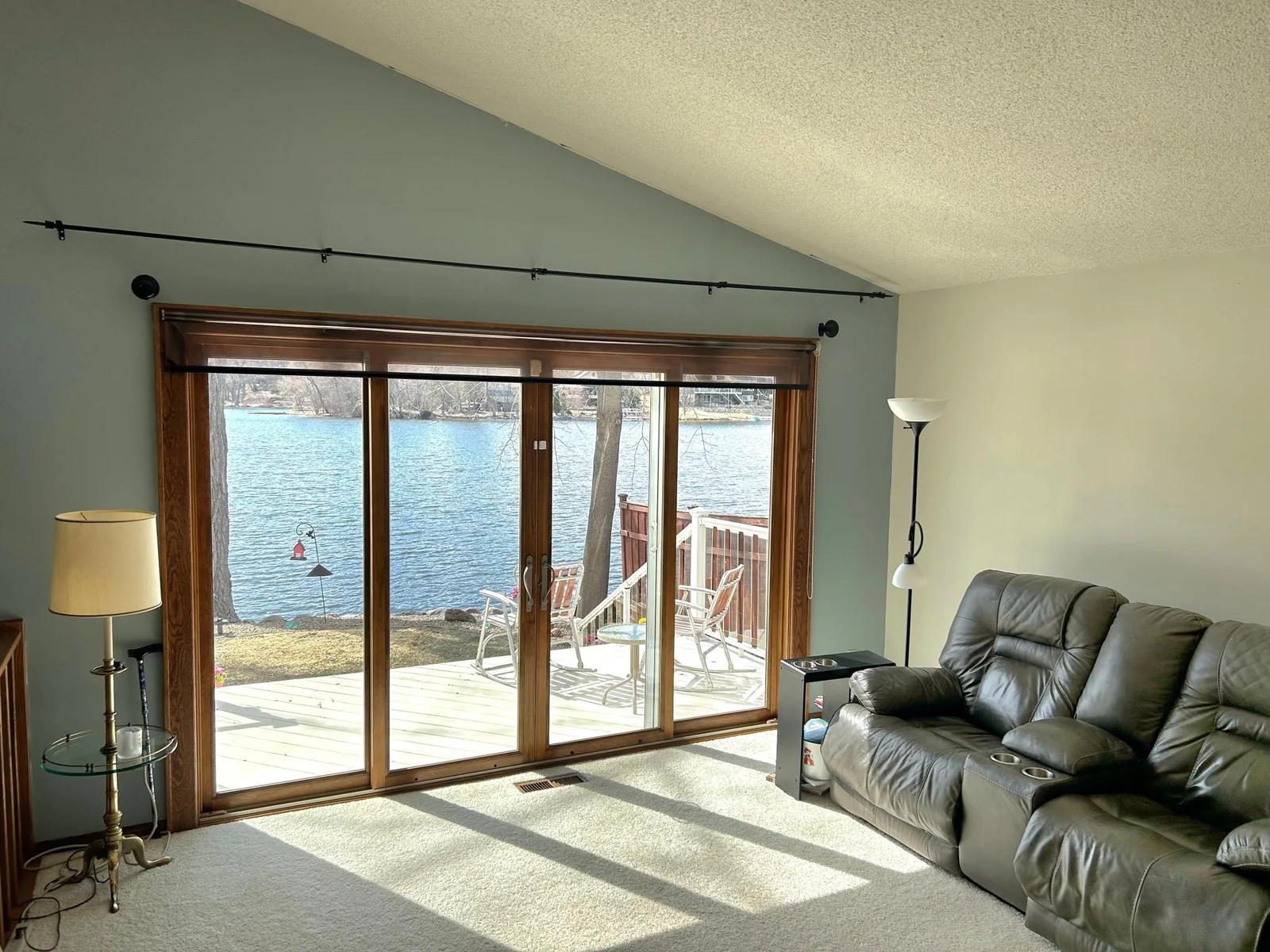 Step out to the lake from the family room on main level!