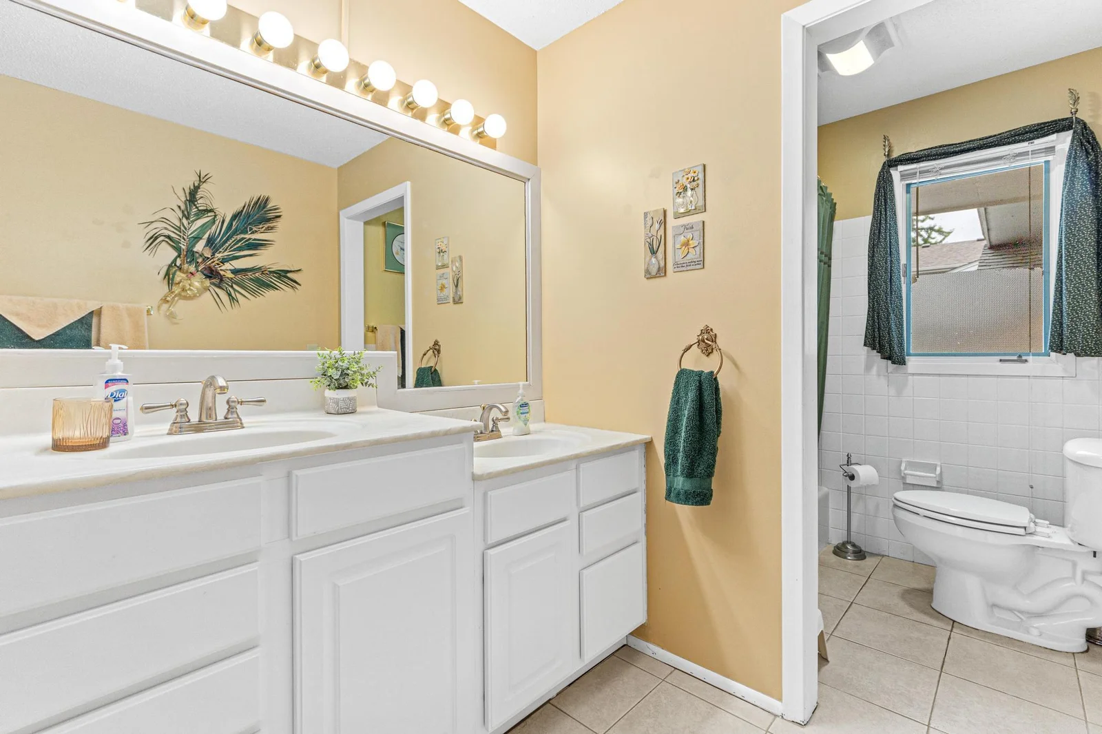 Main Floor Full Bathroom-double sink and one lower for the kids!