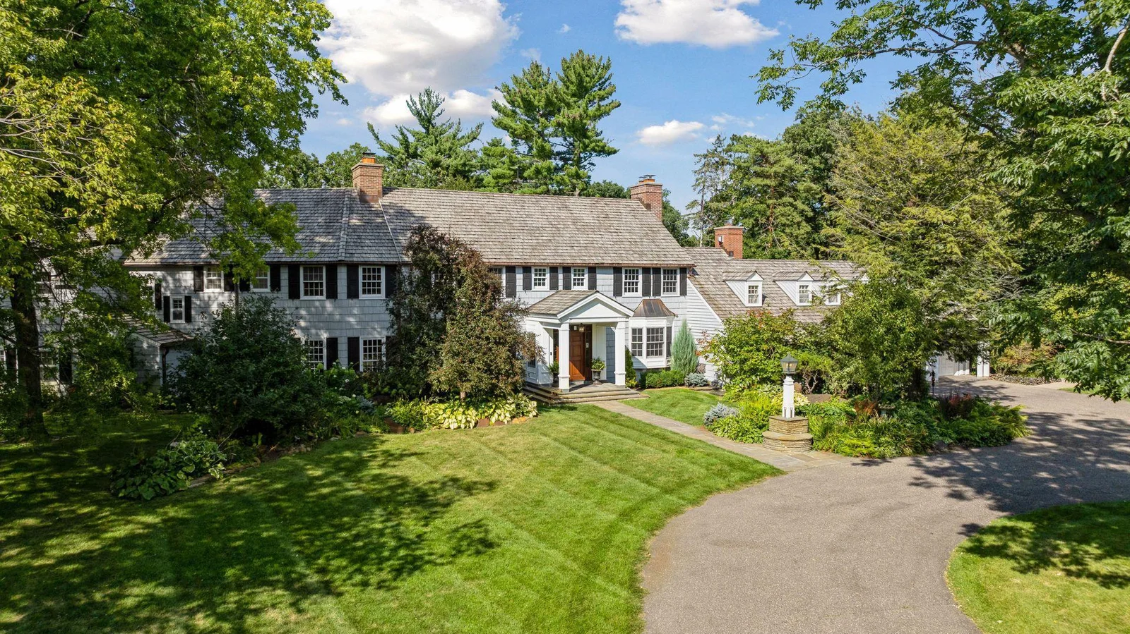 Classic Colonial with Cedar Shake Roof, Copper Gutters and 3-Car Garage