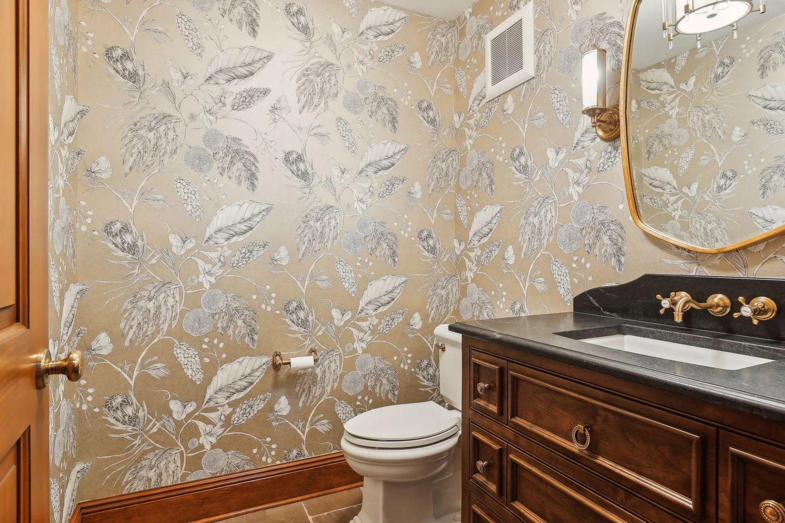 Powder Room off of the Mudroom and Great Room