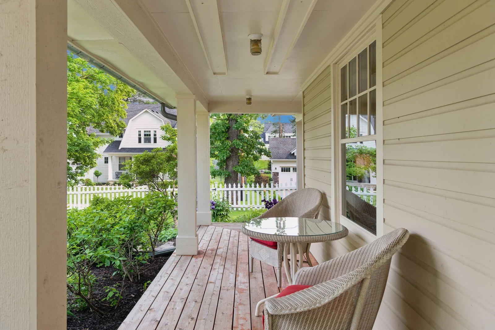 Enjoy warm summer evenings relaxing on the spacious, covered front porch