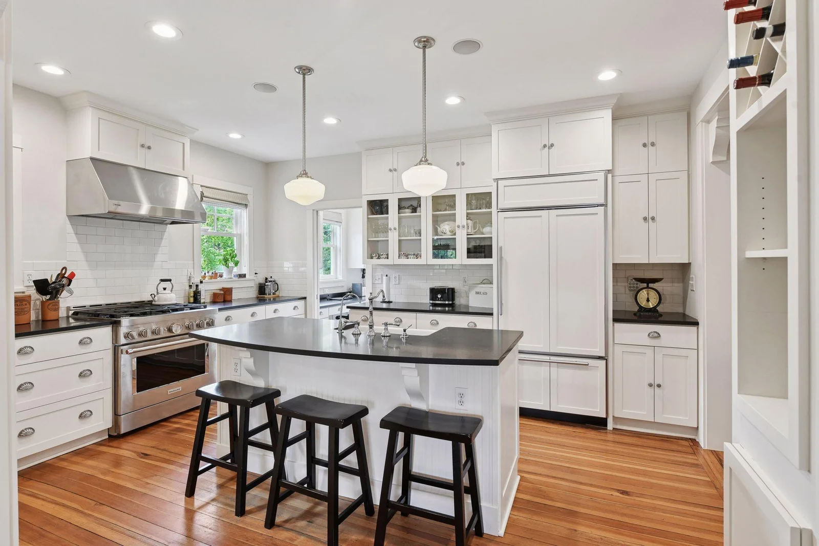 Large center island provides ample seating for casual meals or gathering with guests