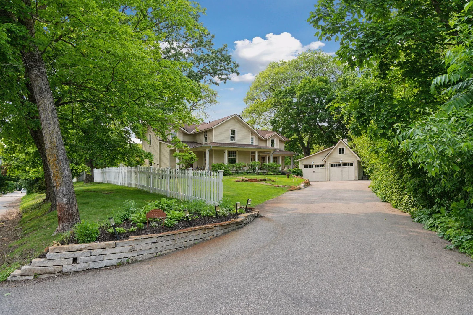 Charming Cottagewood home situated on a private 0.95 acre lot in the Minnetonka school district