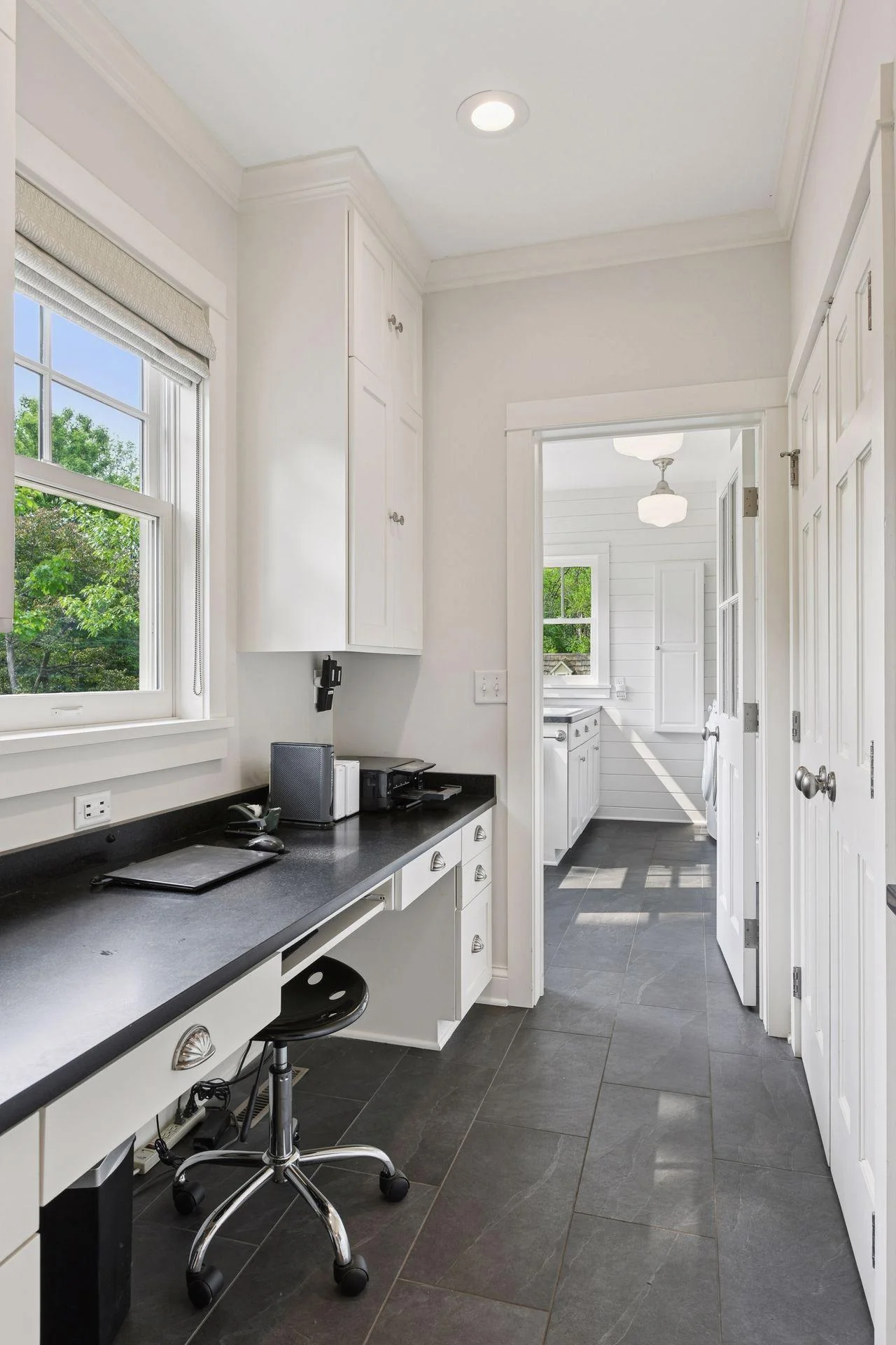 Custom built-in desk near laundry room