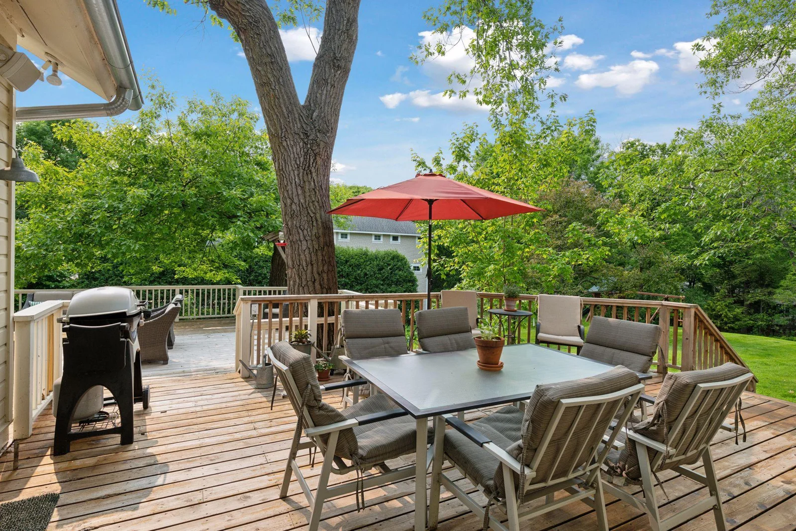 Enjoy alfresco meals and lively gatherings on the generously sized back deck