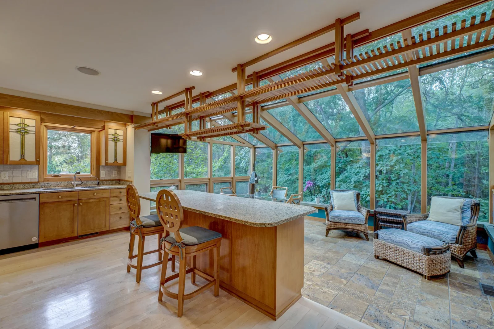 Kitchen with natural cherry cabinets, granite counter tops, sub zero and viking appliances.