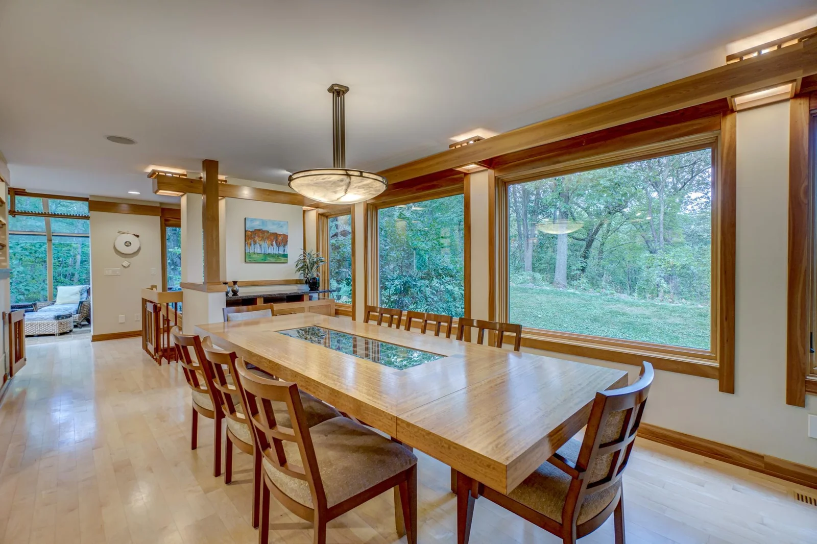Formal dining space-maple floors with walnut accents