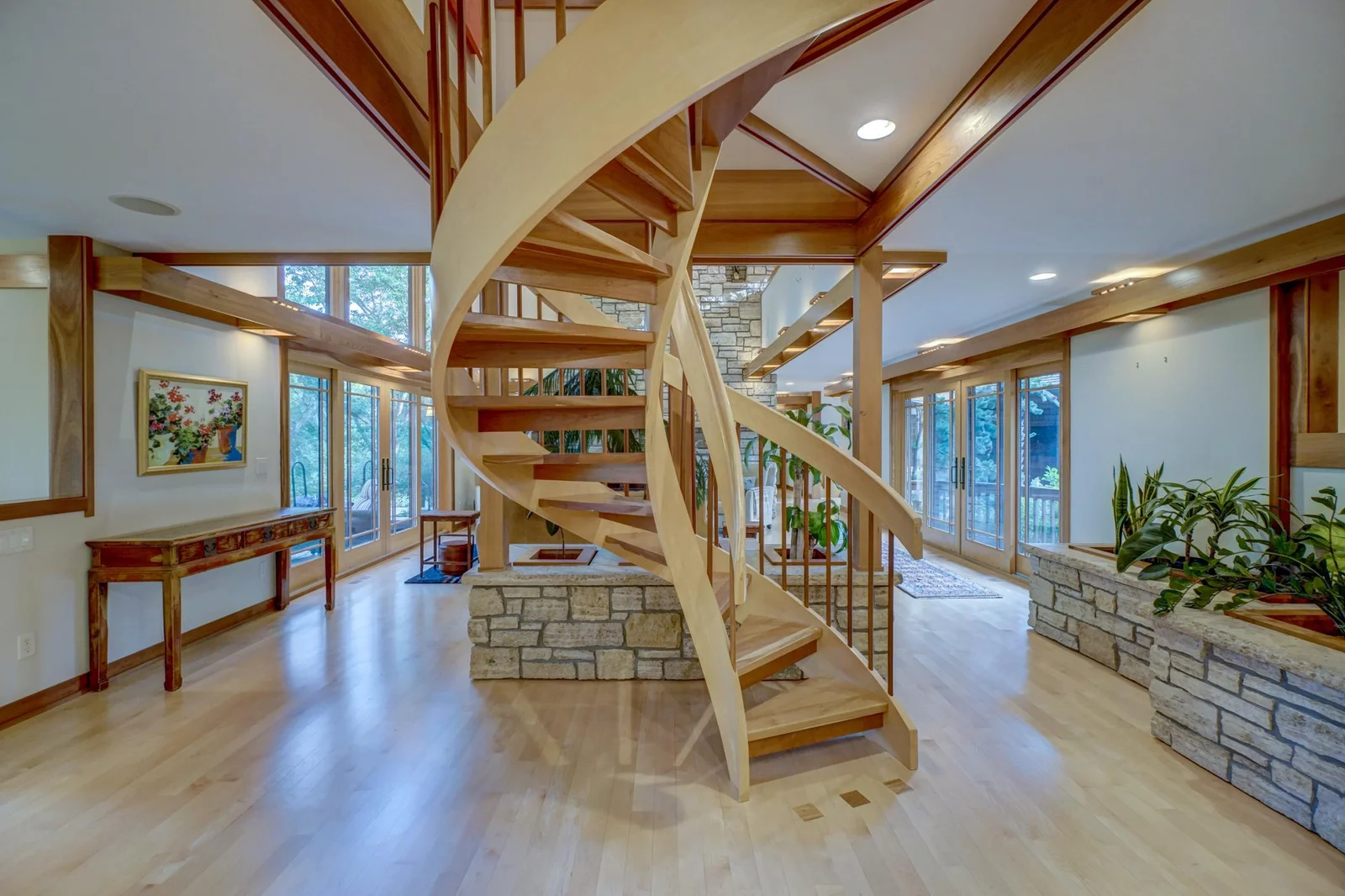 Each floor has two sets of stair cases including this custom York spiral stair case