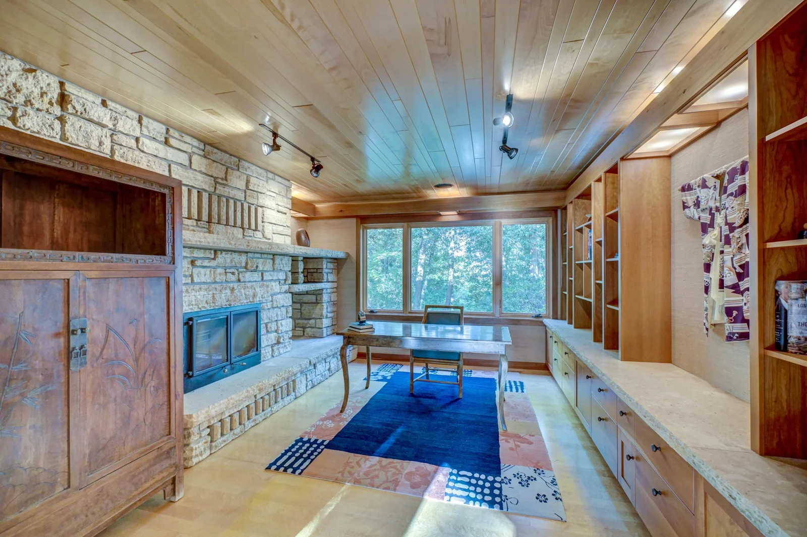 Office with curly maple floors