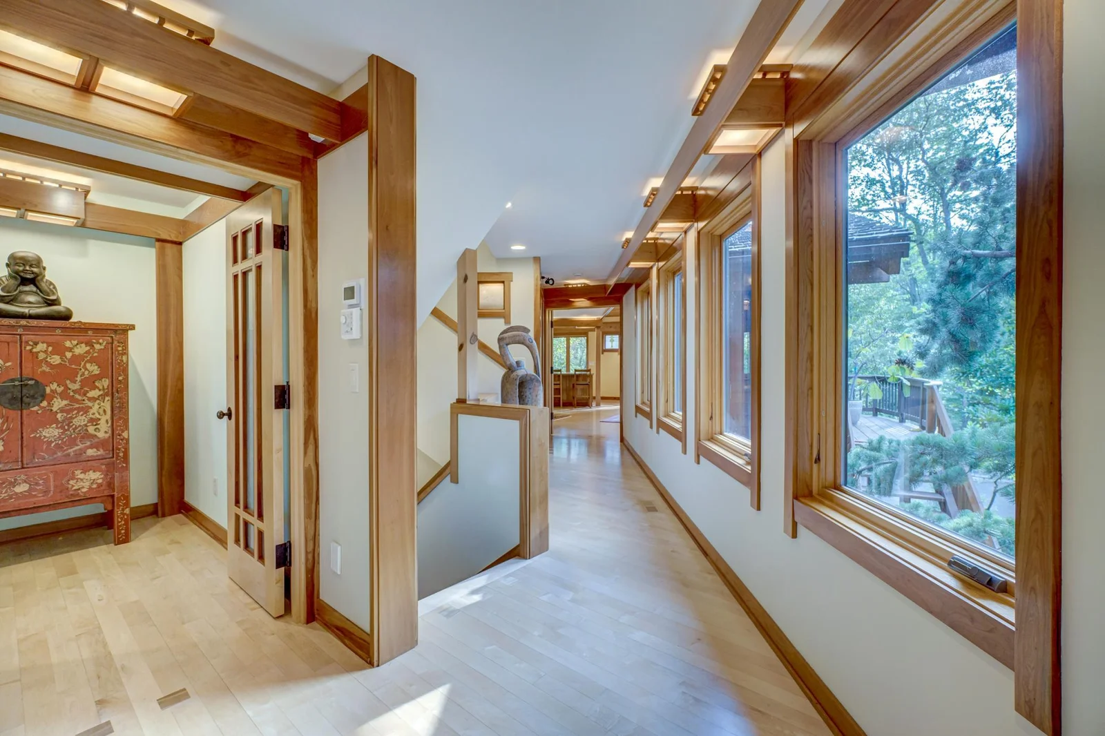 Second set of stairs and hallway leading to separate in-law suite
