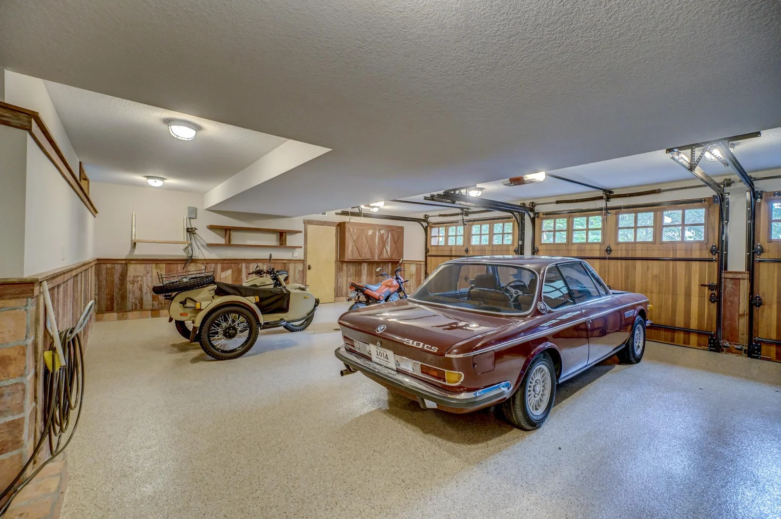 Completely finished garage with in floor heat, epoxy floors and drains
