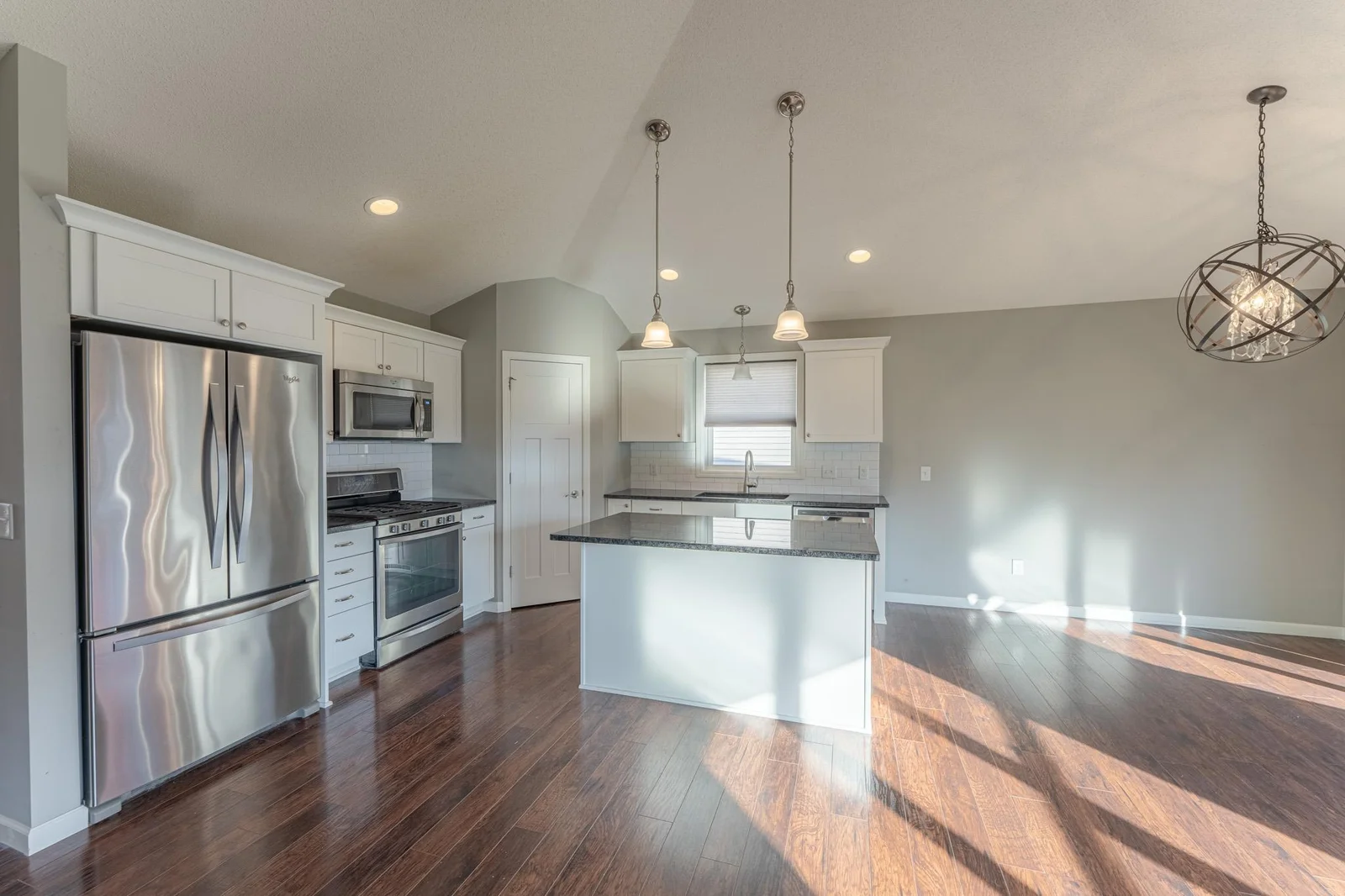 Bright kitchen with updated appliances.