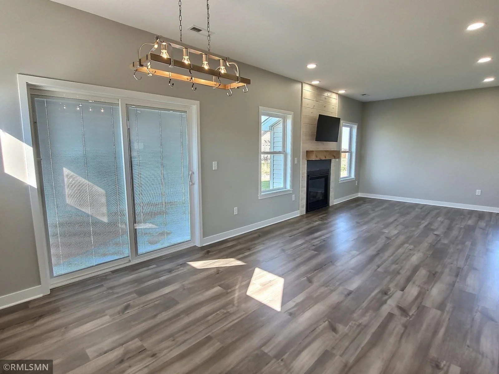 Dining area will walk out to a feature patio and then on to the lake. Photo is from builders model home and this is what will be built on the lot.