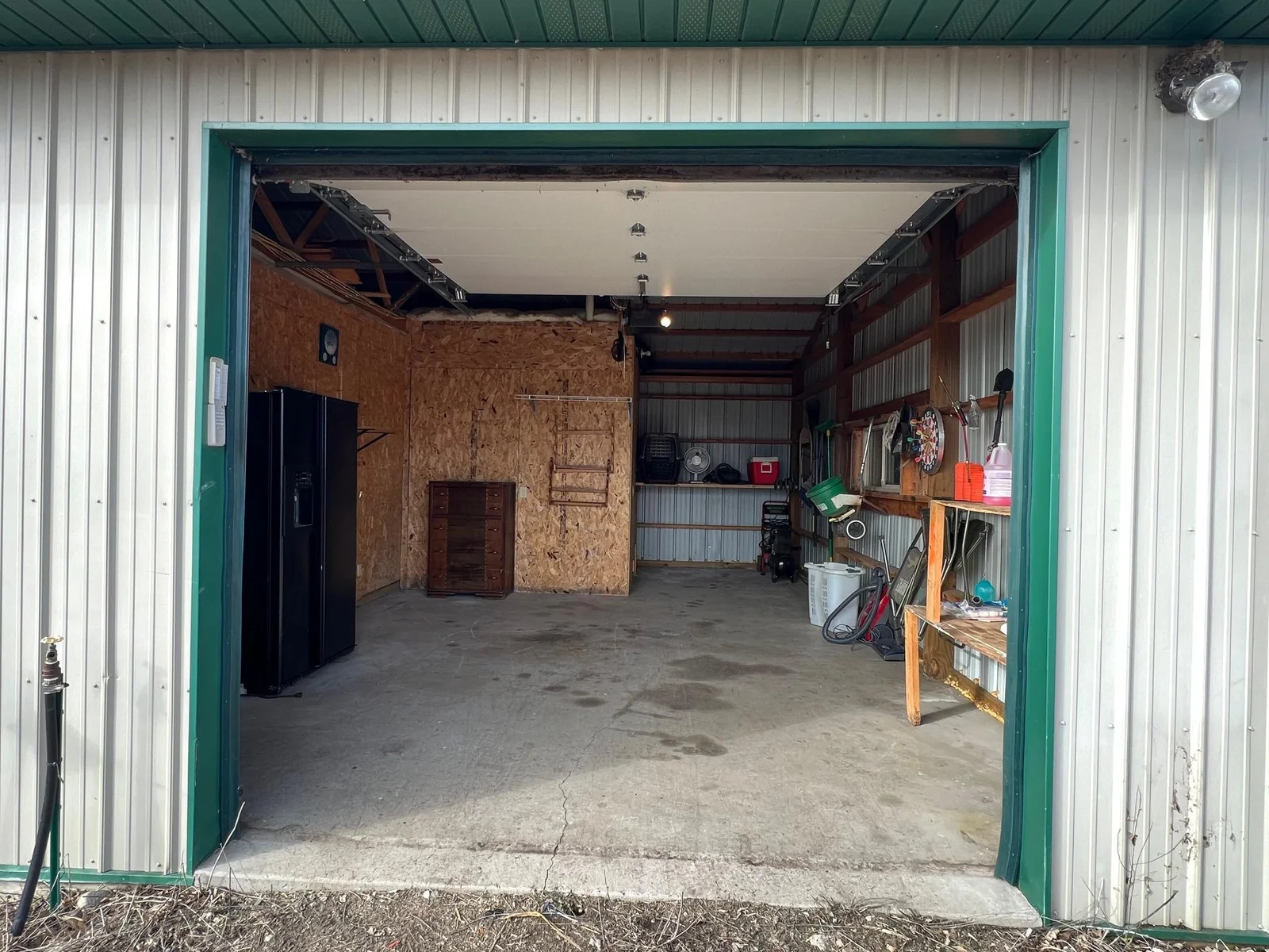 Separate automatic garage door entrance to storage area