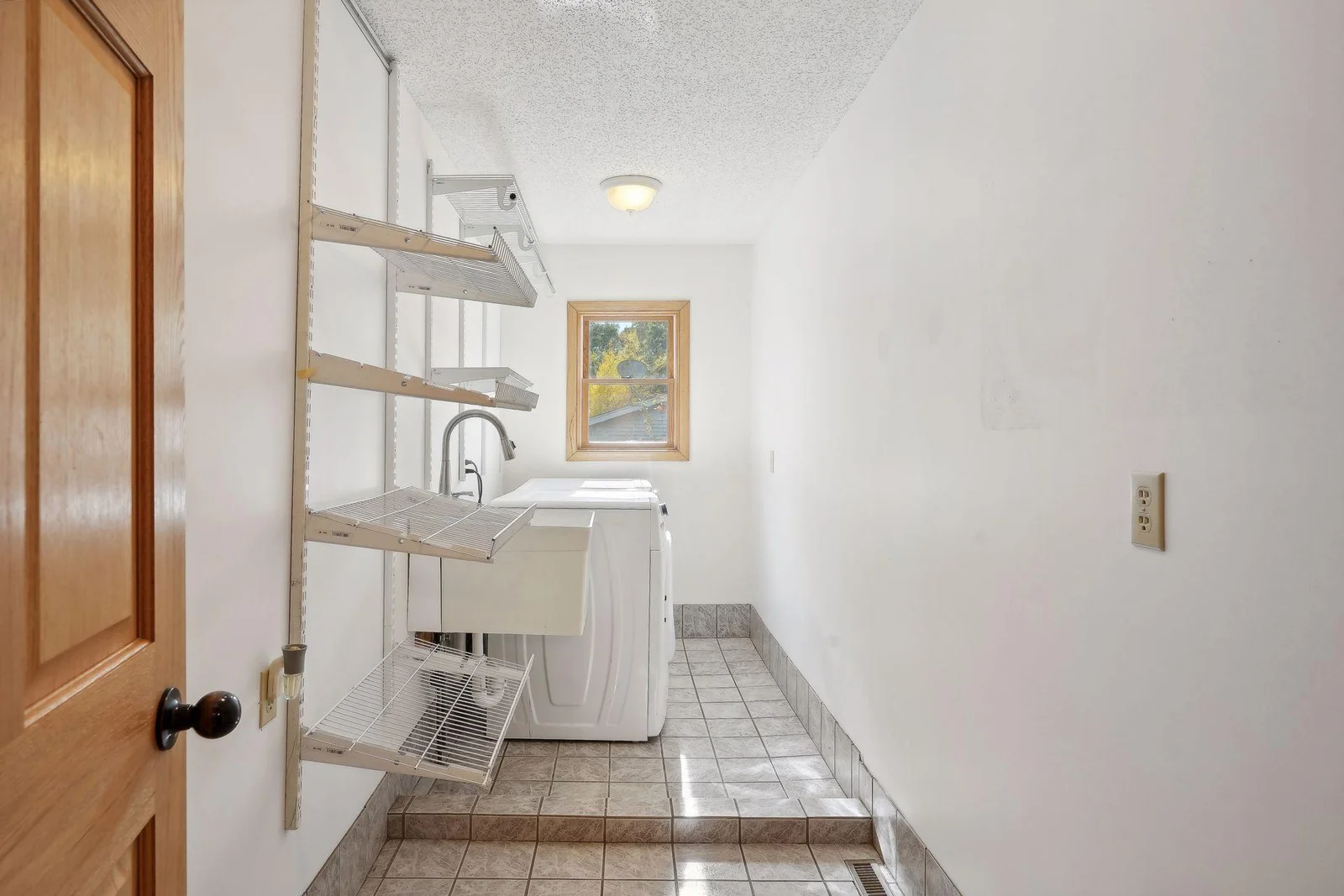 Main floor laundry. There is also hook ups in the lower level if you prefer.
