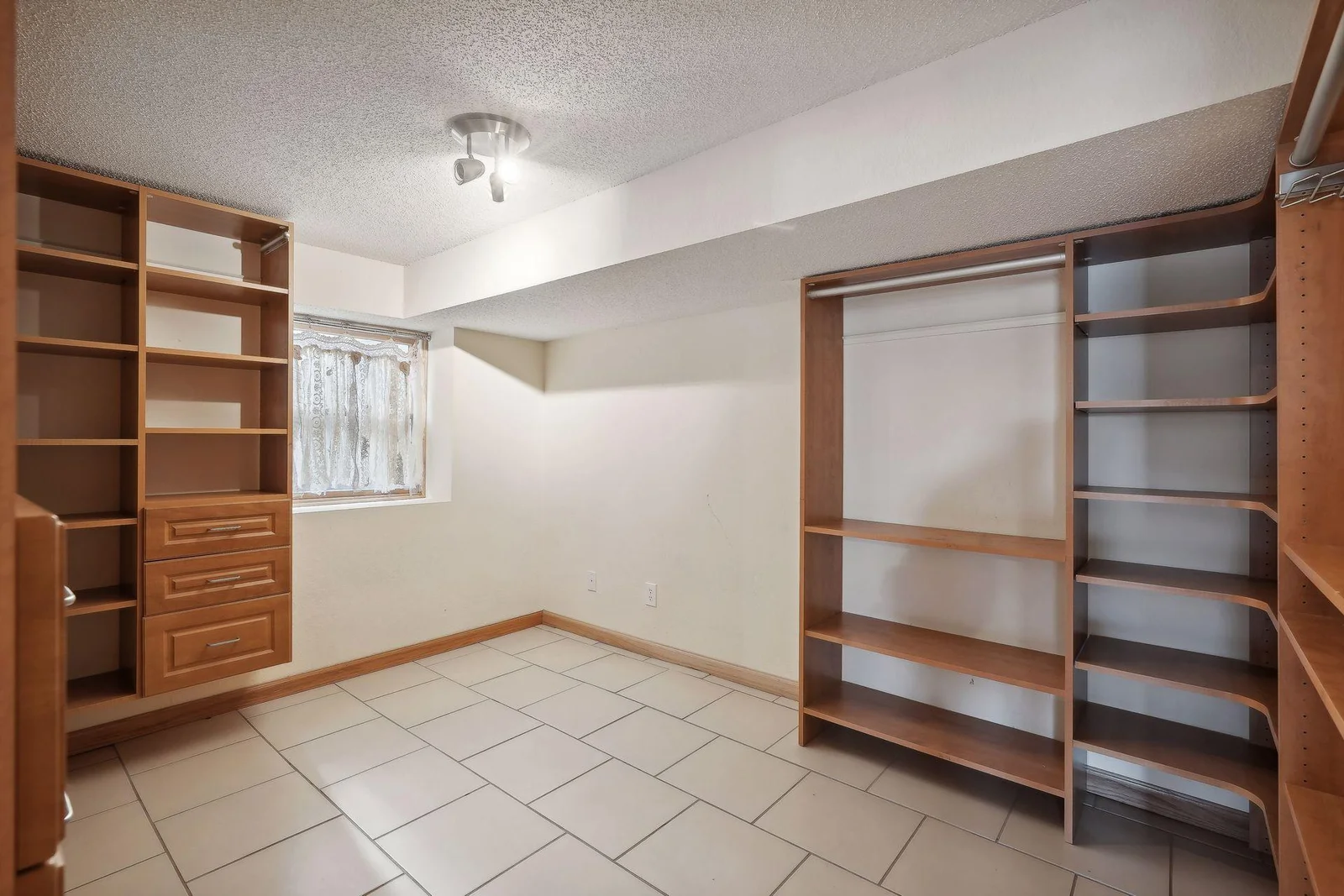 Lower level flex room with built ins.