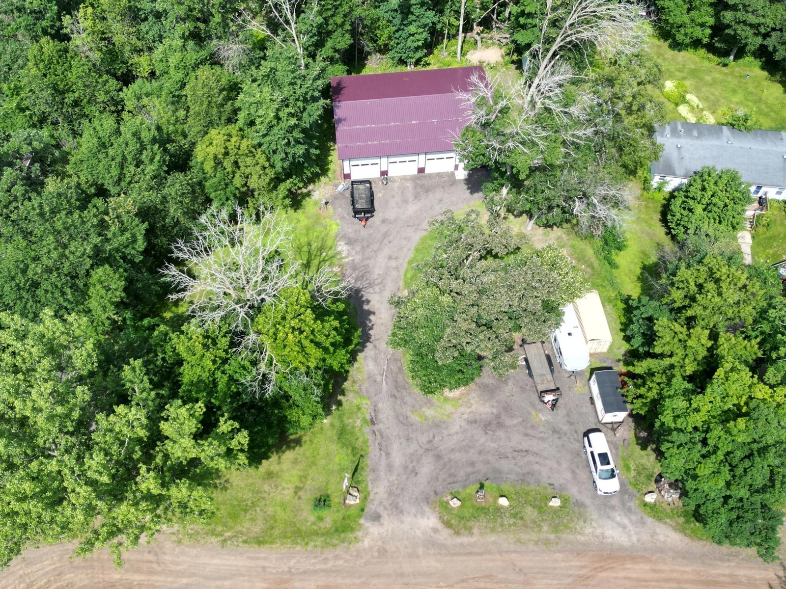 .30 acre lot with shop across the street, Look at all that hard to find parking space with lake homes!