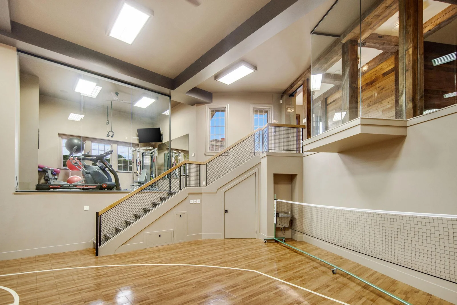Together, the sport court and gym create a dynamic and versatile space for fitness, recreation, and fun, making it a true haven for sports enthusiasts and families alike.