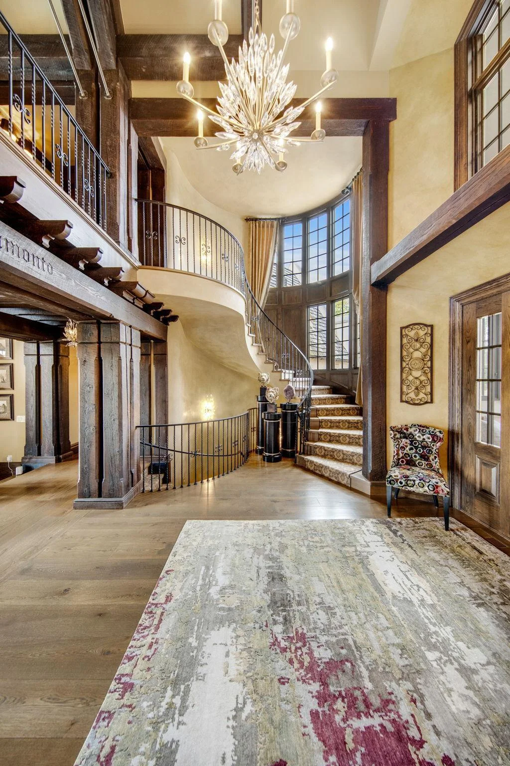 The journey upstairs sets the tone for the spaces to come, whether they lead to additional bedrooms, a cozy office, or a breathtaking view from a balcony. The spiral staircase is not just a means of travel; it’s a stunning architectural feature.