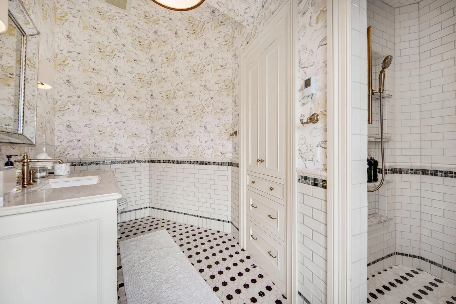This en-suite bathroom transforms the upper-level bedroom into a luxurious haven, providing everything needed for a tranquil and indulgent experience.