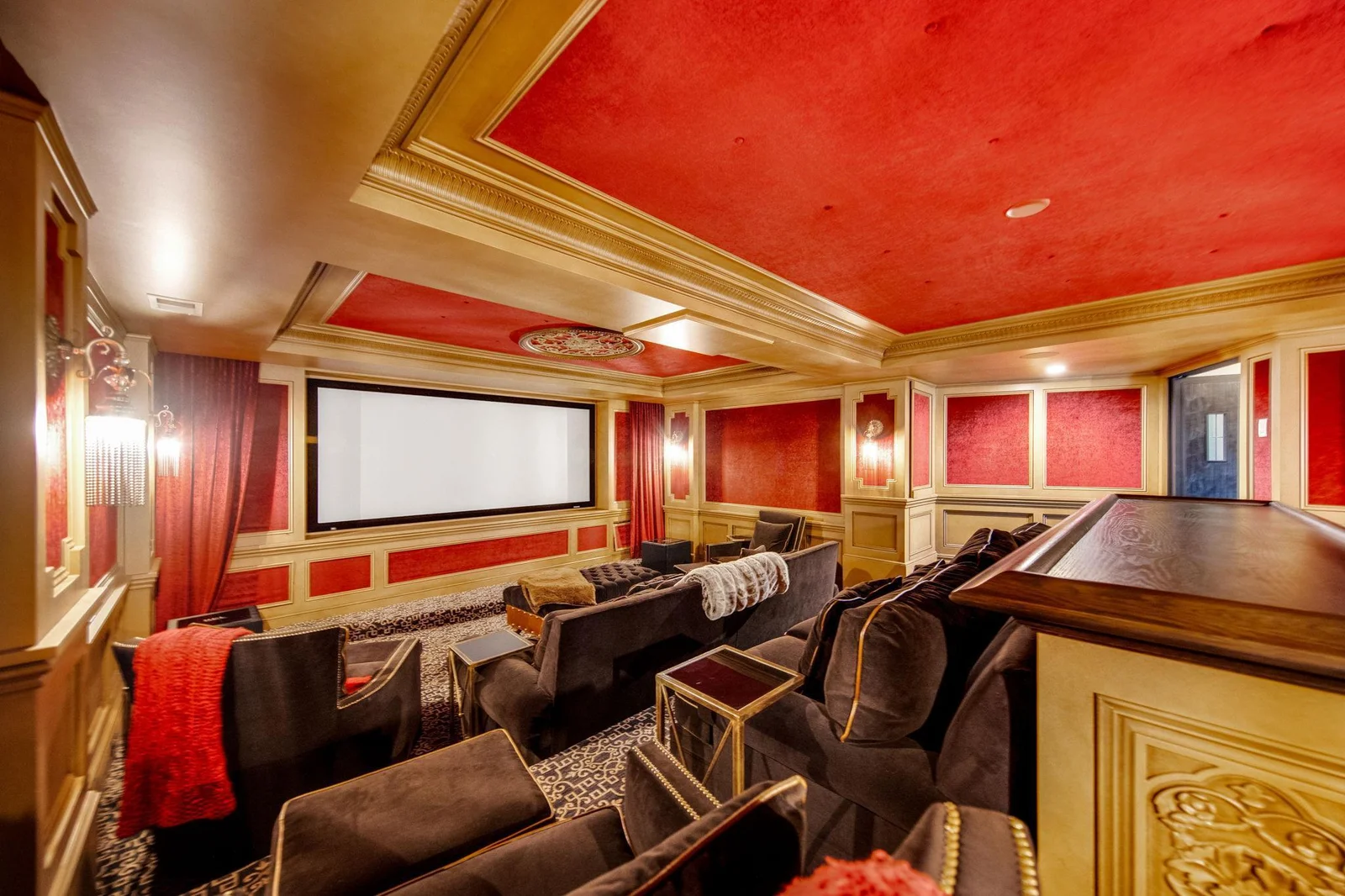 The stadium seating ensures that every guest has a perfect view of the screen, providing comfort and style with plush, tiered chairs that enhance the cinematic ambiance.