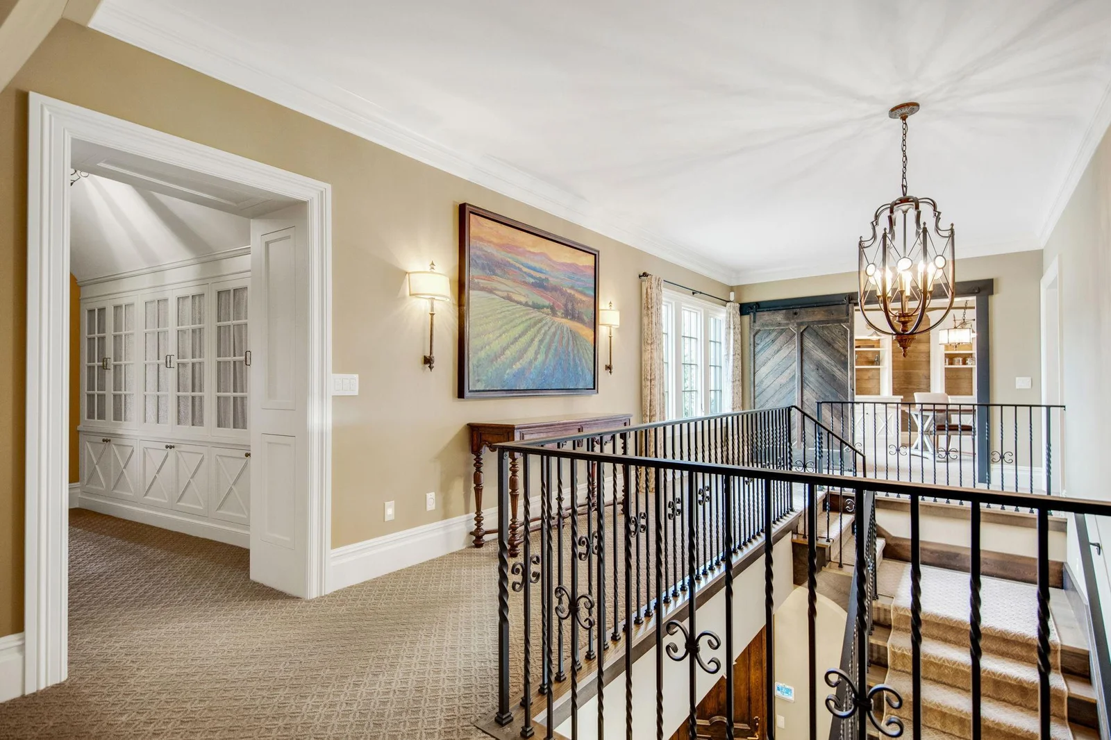 Hallway leading to the 3 additional upper level bedrooms.