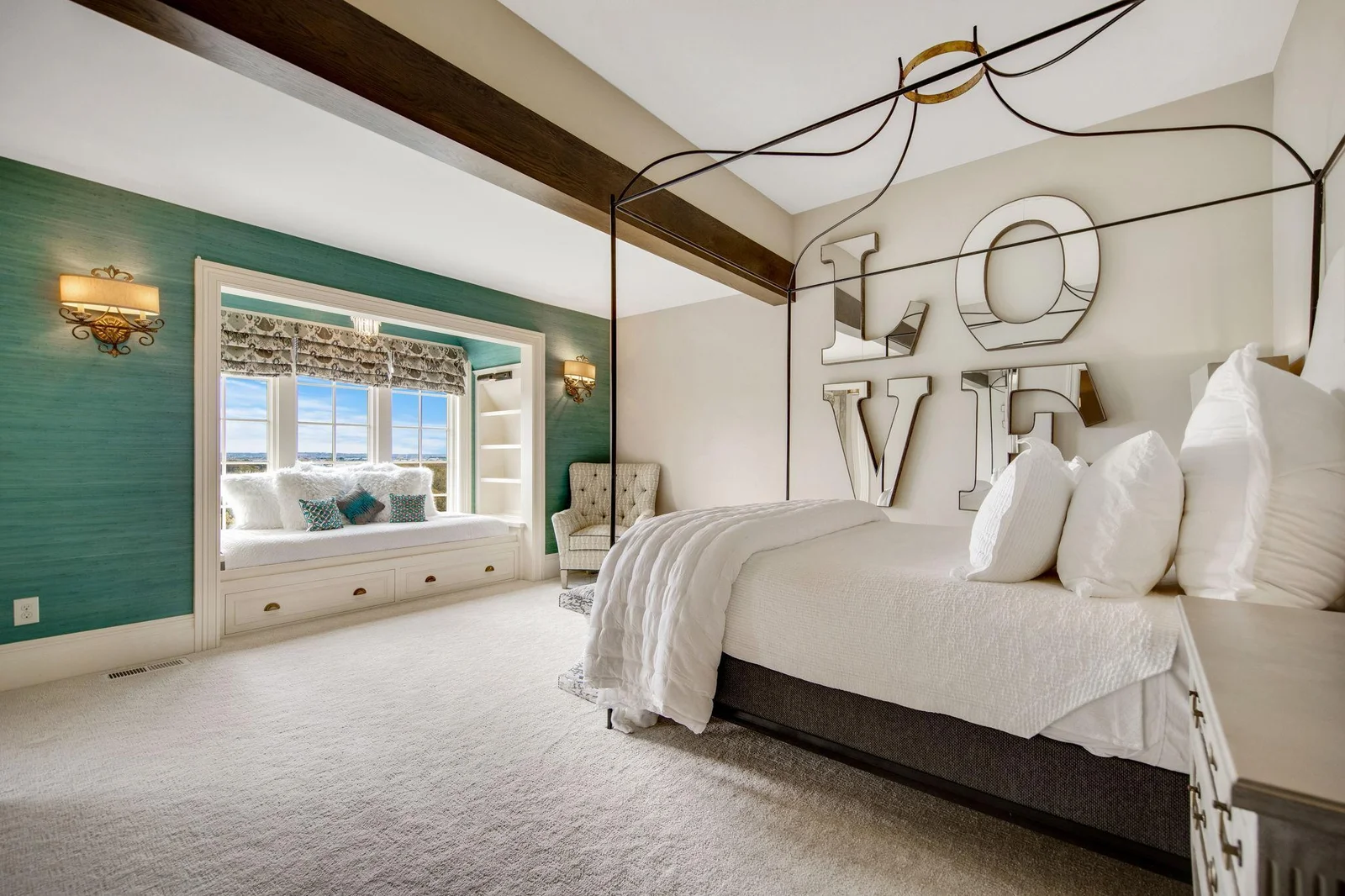 The 2nd upper level bedroom's design harmonizes comfort and elegance.
