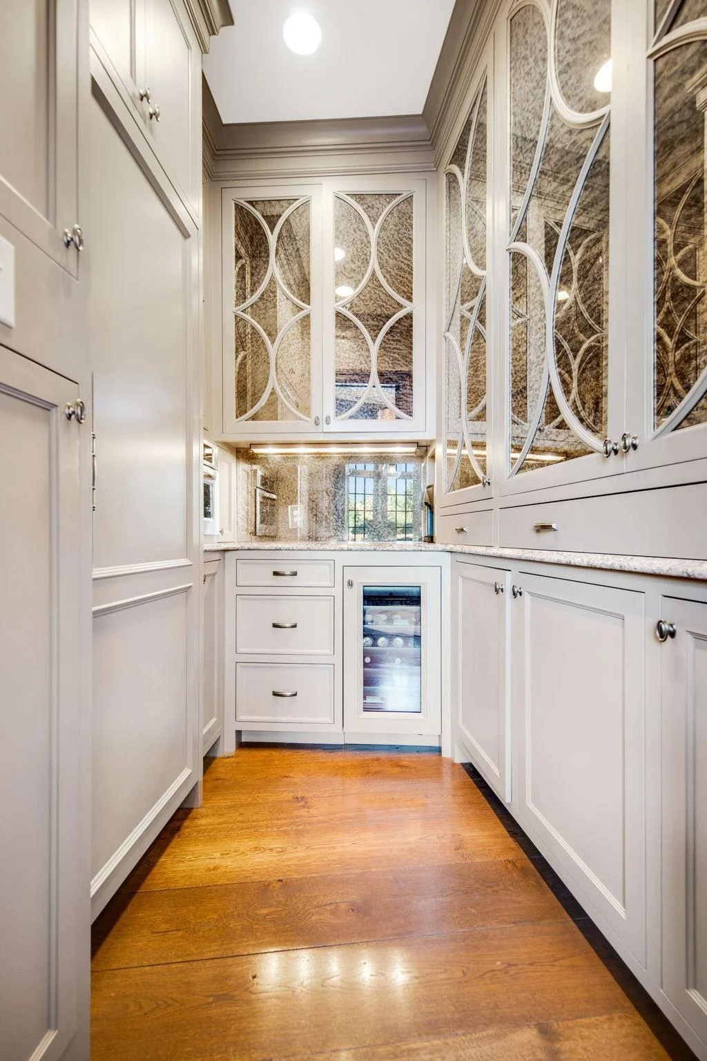 Off the kitchen is the butlers pantry’s. Elegant finishes and carefully designed organization enhance the overall flow of the space, making it an essential yet stylish hub for entertaining.