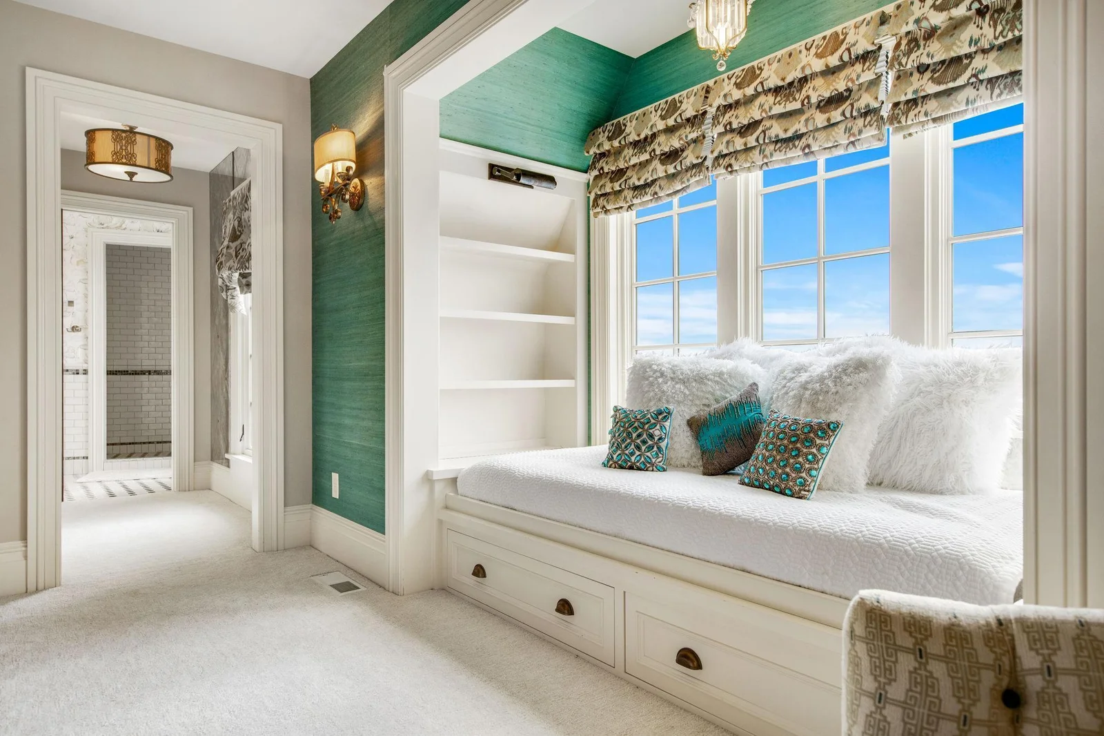 The window bench not only enhances the aesthetic but also provides a cozy nook that adds character to the room.