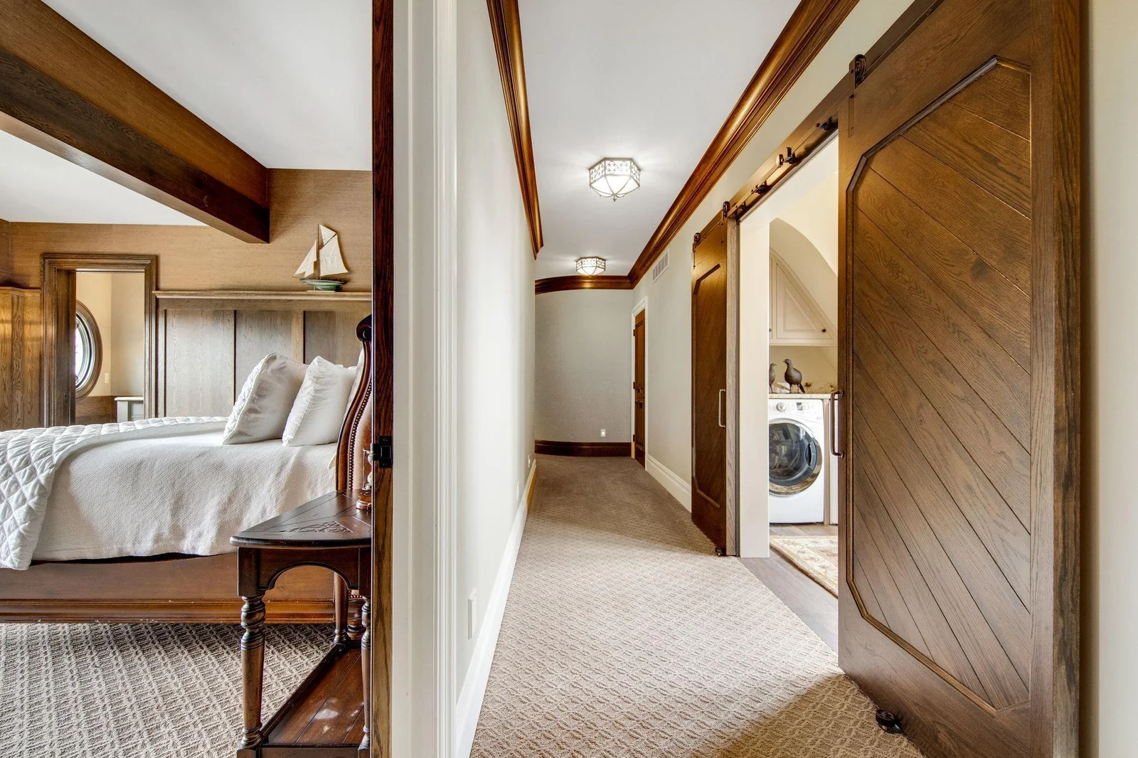 Enter the hallway which lead to the upper level laundry room.