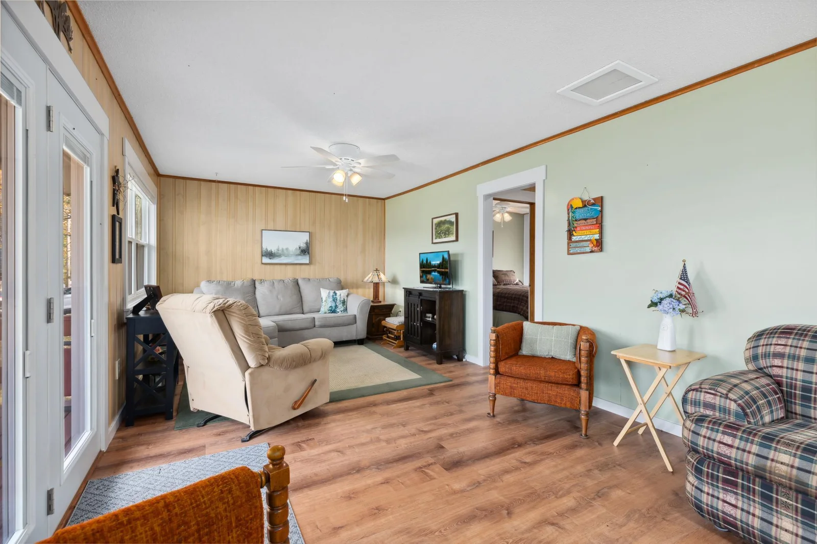 Living room and dining room are spacious with great access to the large deck overlooking the lake.