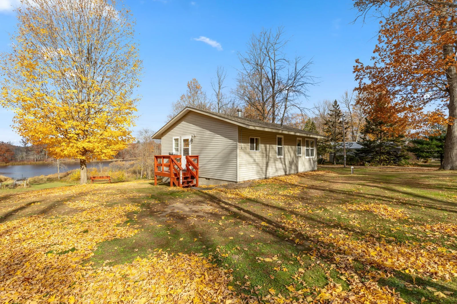 Side door entrance with small deck
