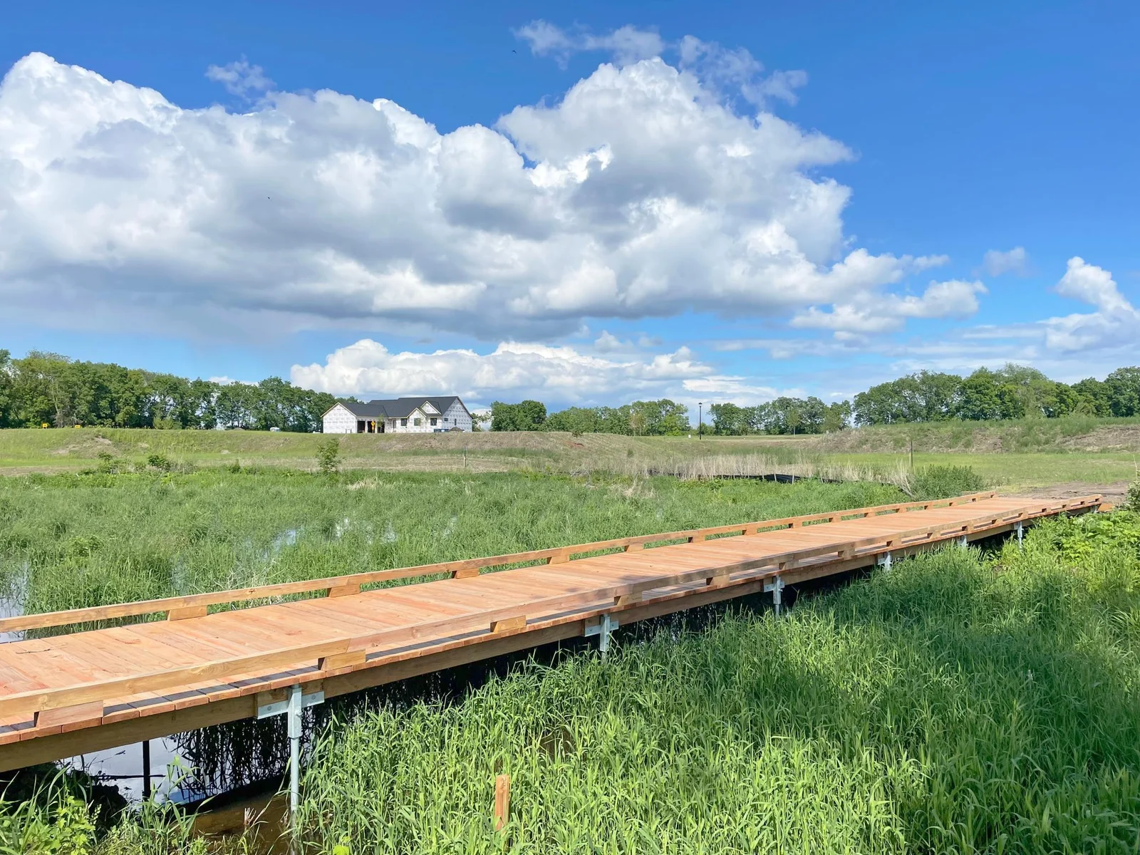 This lot offers an 8 foot boardwalk leading to the lakeshore..jpg