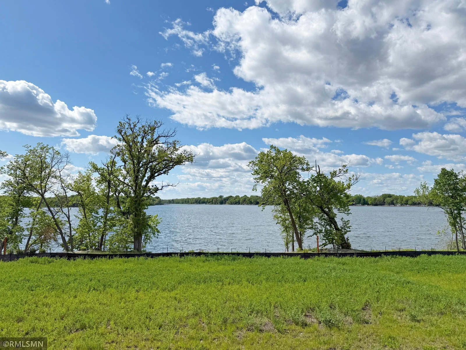 You will fall in love with over 85 feet of sandy-hard bottom shoreline, perfect for your dream home.