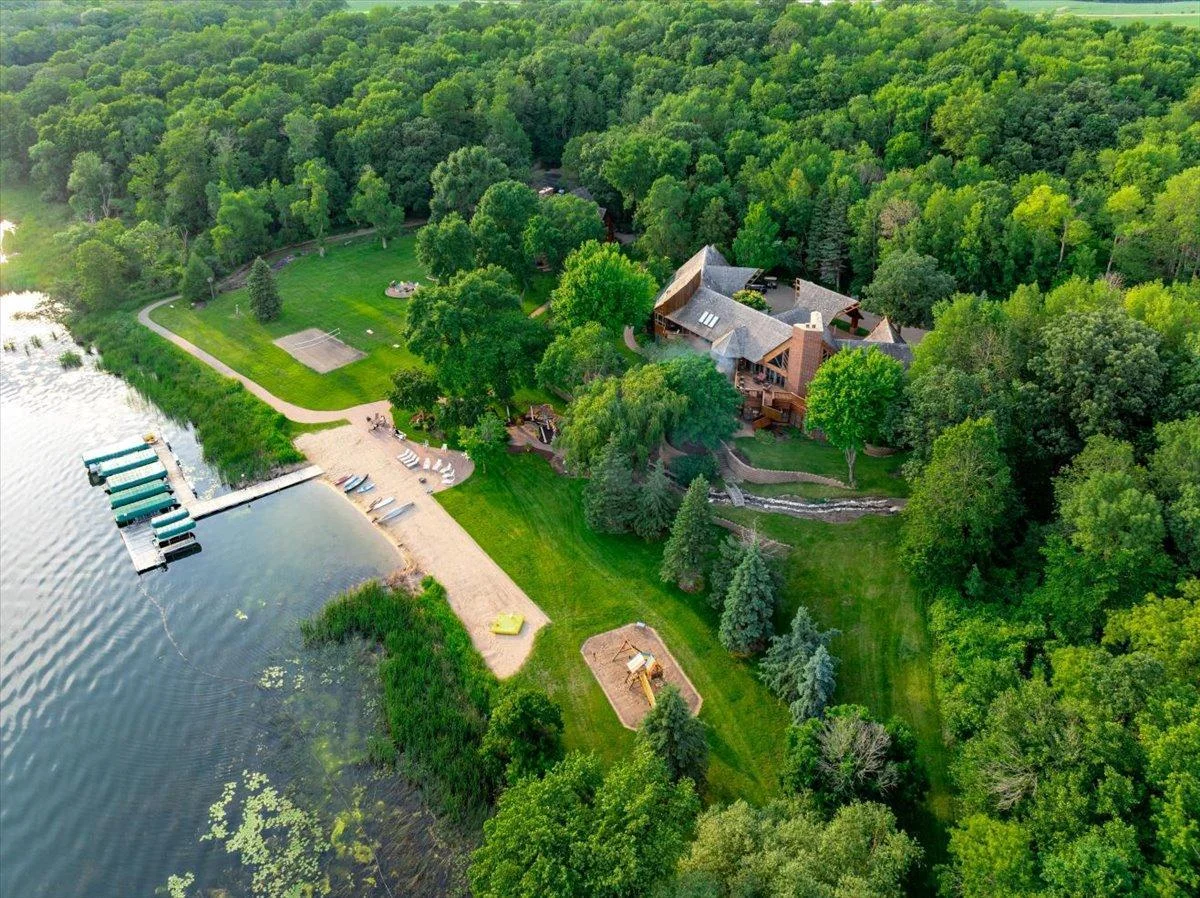 The famous Brentwood Estates offers 1,200 feet of lakeshore includes a sandy beach, dock systems with electric lifts and lush green spaces.