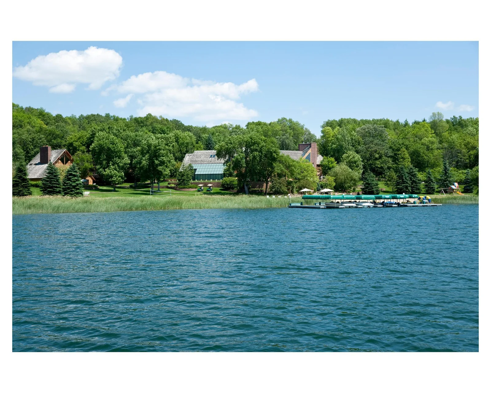 The lake is 1175 acres (approximately 3 miles long and 3/4 miles wide) and 98 feet deep