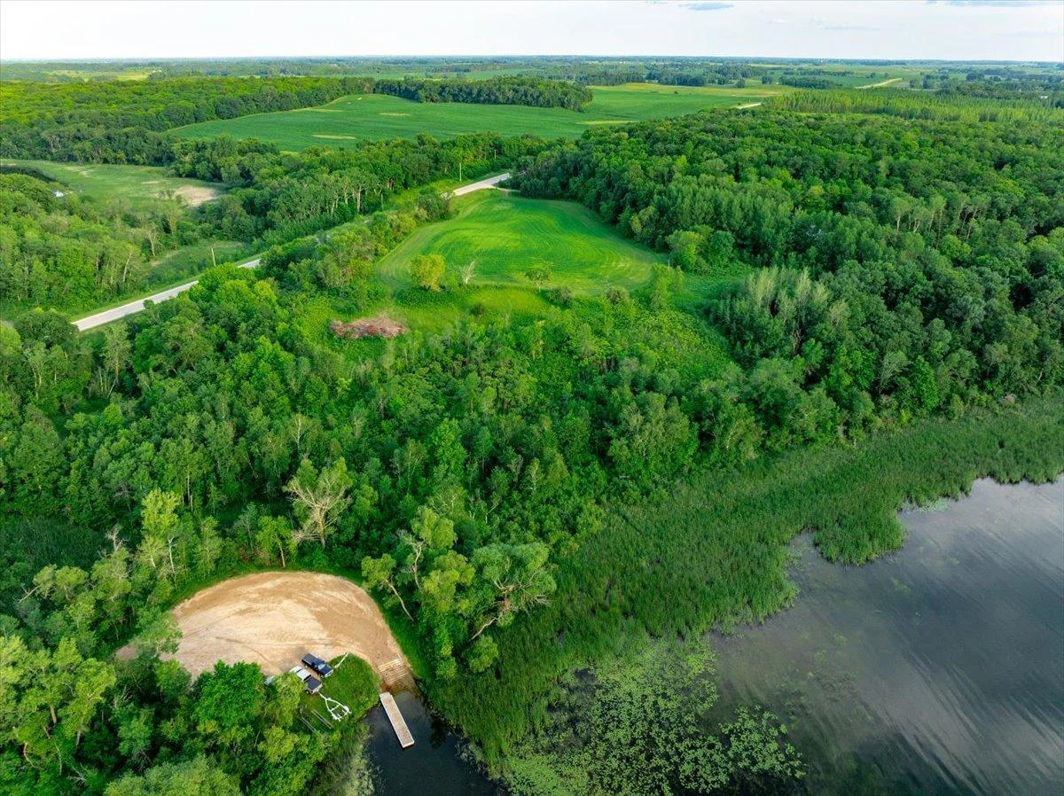There is an additional 15.5 acres and another 800 feet of lakeshore connected to this property.