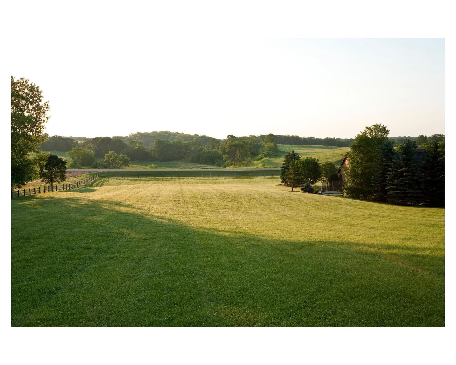 Enjoy the beautiful warm glow of the sunrise on top of the meadow